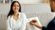 Adult woman smiling while attending a counseling session